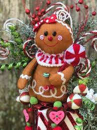 A gingerbread house theme decorations theme is not complete without a gingerbread man prop! Gingerbread Christmas Arrangement Gingerbread Theme Etsy Christmas Arrangements Gingerbread Christmas Gingerbread Theme