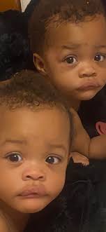 Identical twins studying weather and physical therapy