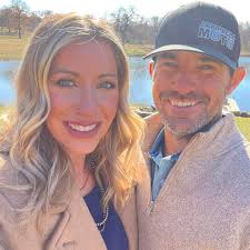 There is a bike helmet at scoring trailer found by bathrooms.