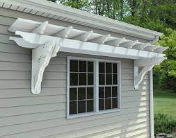 Vinyl Eyebrow Breeze Wall Mount Pergolas Pergolas By Mount Garage Pergola Garage Pergola Kits Outdoor Pergola