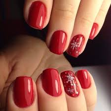 Use a small dotting tool to create small clusters of one to three red dots. Christmas Nail Art In Red