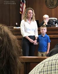 My husband accused me of taking his money and ruining his business. Right  as the verdict was about to be given, my son ran to me, hugged me, and  whispered, "Mom… the