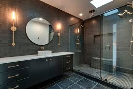 A mix of ann sacks surfaces, including a pebble wall covering, brings a warm feel to a guest bath of an aspen, colorado, home which was renovated by stonefox architects. Bathroom Remodeling Ideas