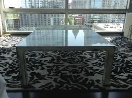 With the easy to use mechanism, you can easily turn this coffee table into a dining table this item comes shipped in one carton. Custom Made Sexy Steel Low Coffee Table In Titanium White Cream And Almond By Dangerous Color Custommade Com