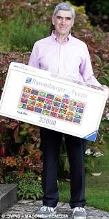 Mcclure is the world's largest jigsaw puzzle and even has a guinness book of world records certificate to prove it. In Pieces World S Biggest Jigsaw Puzzle Collapses In Front Of The Photographers Daily Mail Online