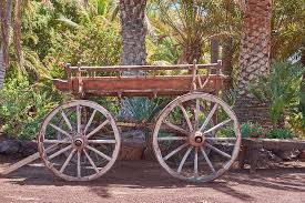 This beautifully handcrafted wagon wheel makes a nice lawn ornament or garden accent piece. Hd Wallpaper Dare Wood Wagon Wheel Wheels Wooden Wheel Decoration Antique Wallpaper Flare