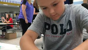 Wilbur Elementary School students create their own society, currency