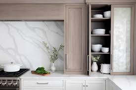 Jumbo designs come in a variety of select sizes. Cooking Alcove With White Quartz Slab Backsplash Transitional Kitchen