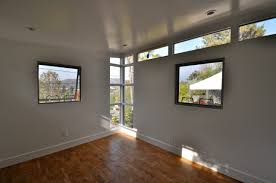 The single sloping roof plane makes the roof easy to build. 10x12 Office Making Room For Baby Midcentury Home Gym Los Angeles By Studio Shed Live Large Build Small Houzz