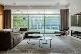 I love this entertainment center. Exclusive Living Room With Big Corner Sofa Modern Coffee Tables Tv And Fireplace And Window Wall Stock Photo Picture And Royalty Free Image Image 150538873