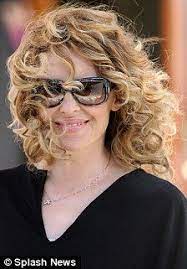 Kylie Minogue Revisits Her Eighties Days As She Steps Out With A New Curly Do Curly Hair Styles Kylie Minogue Hair Makeup