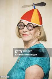 11,722 Woman In Funny Hat Stock Photos, High-Res Pictures, and Images