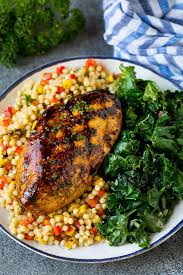 Push the veggies to the side and now add the canned tomatoes with juices, chicken broth, white wine, kale, 1 teaspoon salt, 1/2 teaspoon ground pepper, and 1/4 teaspoon crushed red pepper. Sauteed Kale Dinner At The Zoo