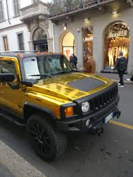 Spotted some time ago, Max Felicitas' gold wrapped [Hummer H3], in  Montenapoleone Street, Milan : rspotted