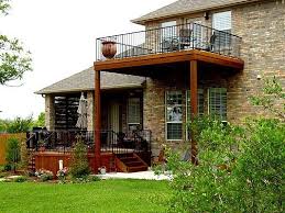 This Custom Design Brought Together A Deck And Second Story Balcony The Deck Is A Great Place To Sit Outside And Balcony Design Second Story Deck Balcony Deck