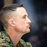 Marine Lt. Col. Lee Hemming speaks during a change