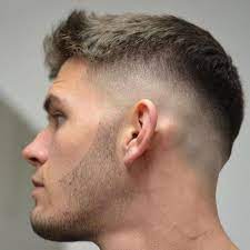 Buzz cut with bald fade design 50 Stylish High Fade Haircuts For Men Men Hairstyles World