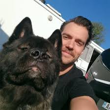 Henry Cavill S Dog Is The Most Huggable Traveling Bear We Ve Ever Seen Henry Cavill Henry Superman Henry Cavill News