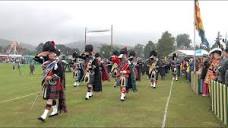 Drum Majors lead salute of the massed Pipe Bands during 2023 ...