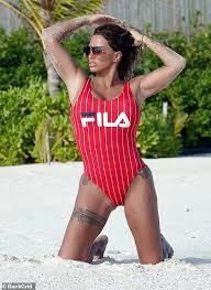 Katie price is a 42 year old british model (adult/glamour). Katie Price Showcases Her Sensational Physique In A Red Swimsuit On The Beach In The Maldives Daily Mail Online
