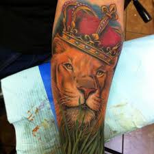 He would give a lion a run for its money to be king of the jungle. Arm Realistic Lion Crown Tattoo By Mike Devries Tattoos