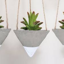 Integrated flower pot concrete flowerpots are excellent for use in flanking large doorways. How To Craft Stylish Concrete Planters Of All Shapes And Sizes