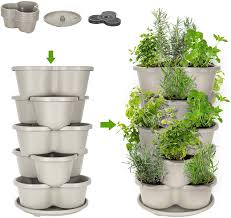 A garden tower project can be as simple as just stacking a few various sized planter pots in ascending size order for herb growing, to building a more elaborate vertical garden tower that is capable of supporting larger food and flower plants. Amazon Com Amazing Creation Stackable Planter Vertical Garden For Growing Strawberries Herbs Flowers Vegetables And Succulents Indoor Outdoor 5 Tier Gardening Tower Vertical Planter Off White Garden Outdoor