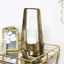 Nordic metal candle holder living room wine cabinet sculpture decoration desktop creative crafts ceramic candlestick holder. Gold Glass Candle Holder