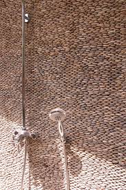 But to make a bathroom look extraordinary one should think properly of the design for space. Pebble Feature Walls Mosaics In Wet Areas Pebbles In Bathrooms Natural Stone Sussex