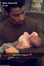 Nick Jonas cradles his newborn niece Valentina for first time in Snapchat  post