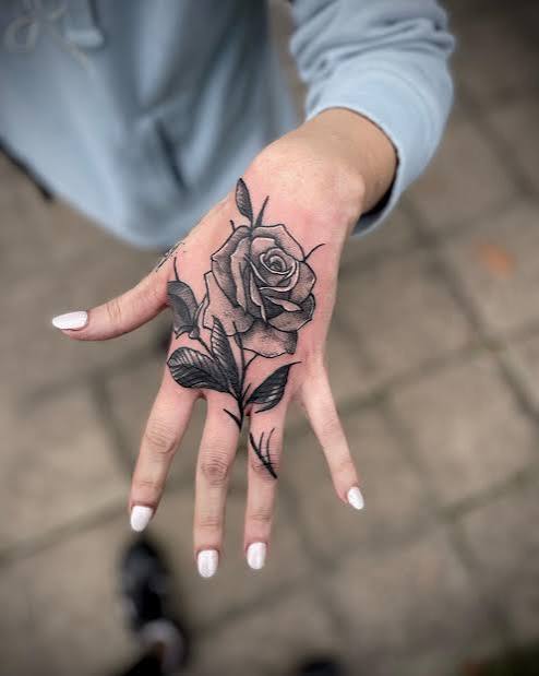 25 Bold and Beautiful Rose Hand Tattoos to Inspire You