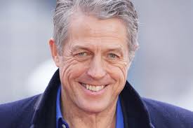 Hugh Grant settles claim against Sun publisher due to risk of £10m legal  costs