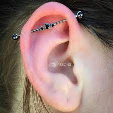 70 Bold And Beautiful Industrial Piercing Settings For A Head Turning Experience Earings Piercings Industrial Piercing Piercing