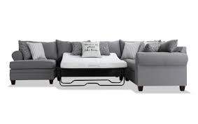 Whether you need a place to gather or a place for overnight guests to rest, our gus sectional is ready to accommodate. Laurel Gray 4 Piece Bob O Pedic Right Arm Facing Sleeper Sectional Bob S Discount Furniture