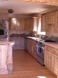 Pin By Katelyn Freelen On Log Cabin Home Ideas Pine Cabinets Pine Kitchen Cabinets Pine Kitchen