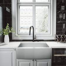Stainless steel kitchen sink with black faucet. Vigo All In One 30 Camden Stainless Steel Farmhouse Apron Kitchen Sink Set With Greenwich Faucet In Matte Black Grid Strainer And Soap Dispenser