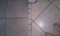Having all the same tile throughout looks more cohesive! Two Different Tiles In Adjoining Rooms