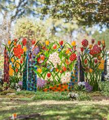 Angel wing hanger cut from salvaged tin and embellished with tin flower. Colorful Metal 3 Panel Butterfly And Flower Garden Screen Wind And Weather