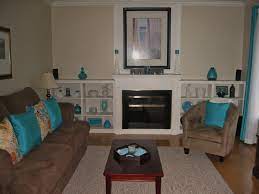 Living Room In Teal And Chocolate Brown Love These Colors But Think I Will Sub Cobalt Blue For The T Living Room Turquoise Teal Living Rooms Brown Living Room