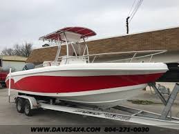Includes fwd fishing deck, forward bench seat, rear storage box bench seat and new ss wheel, helm, steering cable, console, throttle control and cables. 2006 Carolina Skiff 2400 Offshore Edition Deep V Center Console Outboard Boat