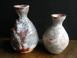 Here Are Two Lovely Shino Pieces The Left Is A Nezumi Shino Vase Can Be Used As A Tokkuri Too By Mizuno Takuzo B 19 Japanese Ceramics Vase Japanese Pottery
