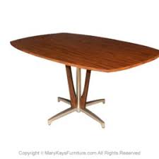 We present you this modern dining set composed of a massive table and six chairs. Mid Century Modern Oval Dining Table Archives Mary Kay S Furniture