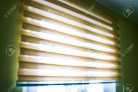 Roller blinds have many great uses & they're also relatively easy to cut & shorten. Closeup Brown Color Roller Blinds Curtains Sunlight Through Stock Photo Picture And Royalty Free Image Image 128411948