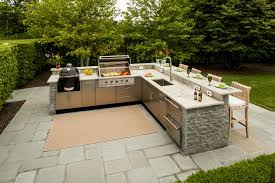 This one is pretty quick and easy to build and if you don't have a deck to build it on, you can build a small patio section pretty easily. L Shaped Outdoor Kitchen Design Inspiration Danver