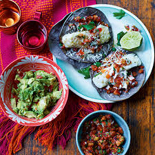 The fish — we use cod, but any flaky variety works — marinates in a mixture of lime juice, chilli powder, and cumin that will become your standard. Thomasina Miers Fish Tacos