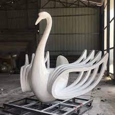 Don't forget to make it more memorable for the kids by reading robert mccloskey's make way for ducklings before you go and then check out the famous duckling statue in the garden. Outdoor Large Metal Painted Stainless Steel Swan Statue
