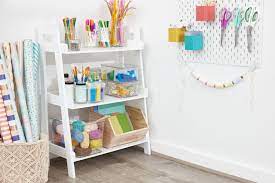 The post includes a diy craft room desk built from stock white cabinets purchased from lowe's and countertops made from laminate flooring and plywood. 15 Creative Craft Room Organization Ideas
