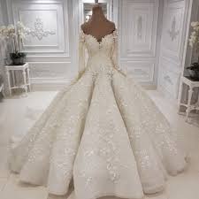A long sleeve wedding dress has one fundamental reason which is to attract attention to your upper parts. Elegant Off The Shoulder Ball Gown Wedding Dresses Long Sleeves Lace Appliques Sequined Bridal Gowns Babyonlinedress Com