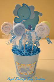 Baby Shower Washcloth Lollipop Centerpiece By Angelblessings12 In 2021 Elephant Baby Shower Theme Baby Shower Themes Baby Shower Diy