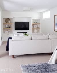 Get tips for arranging living room furniture in a way that creates a comfortable and welcoming environment and makes the most of your space. Modern And Sophisticated Family Room And Playroom Nick Alicia